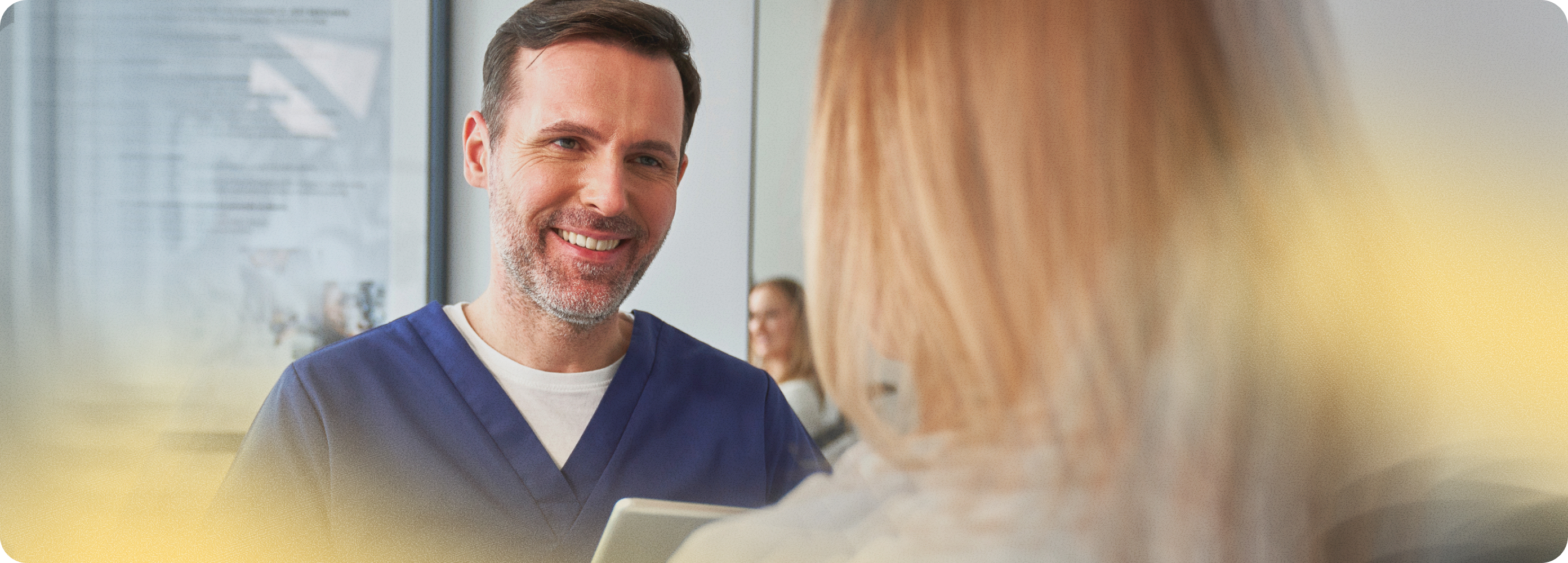 Healthcare provider consulting with patient